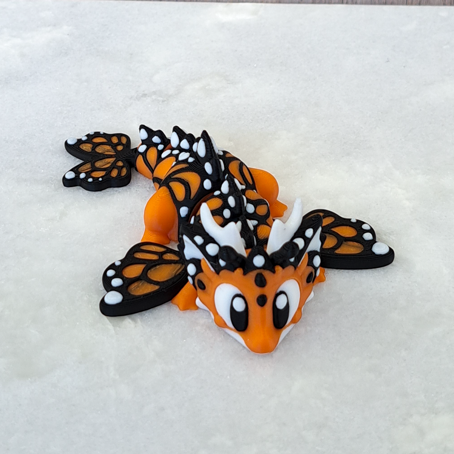 Œuf-Dragon Papillon – Une Métamorphose Magique à Collectionner