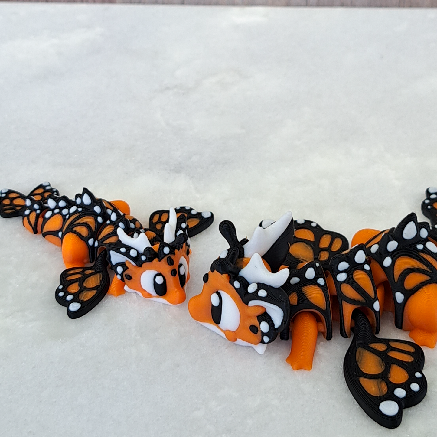 Œuf-Dragon Papillon – Une Métamorphose Magique à Collectionner